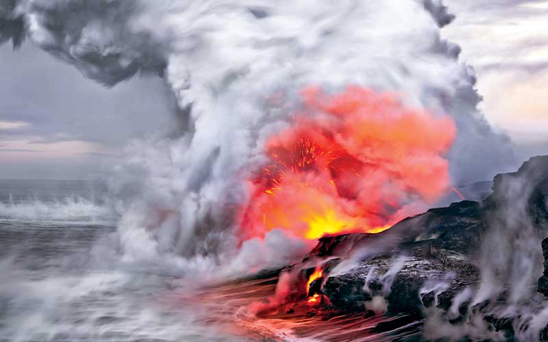 Spewing magma and smoke from an active volcano