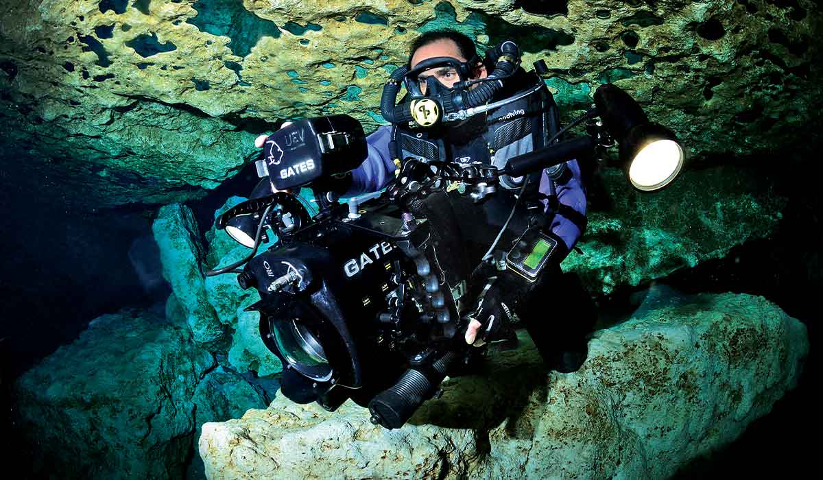 Cave diver explores using a massive camera rig