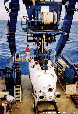 Submersible vehicle is prepped on boat dock