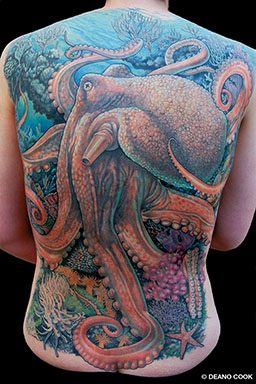 A colorful back tattoo, filling a person's entire back, has a featured octopus