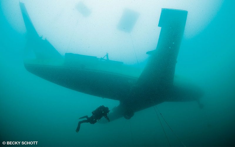 The jet is suspended in 30 feet of water; from the bottom it looks like it’s still soaring.