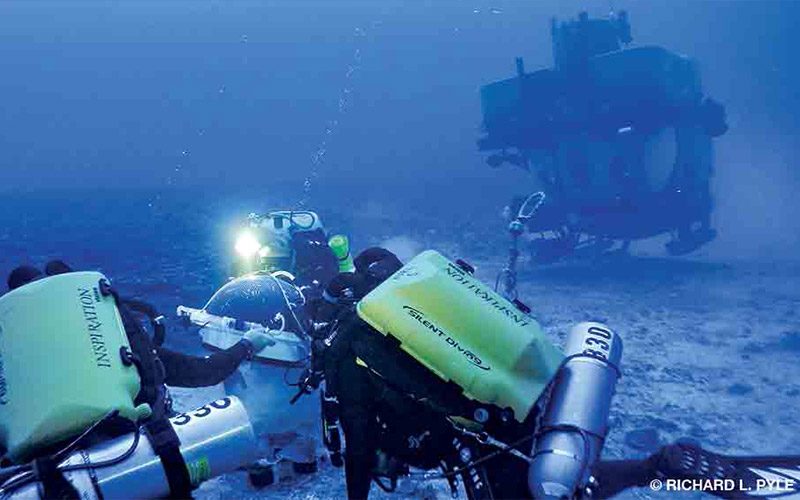 Team of rebreather divers conduct experiments