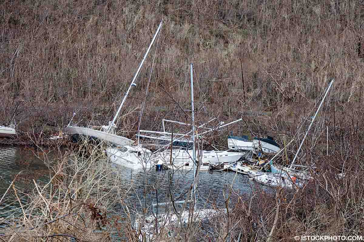 In 2017, boats were ruined by Hurricane Irma.