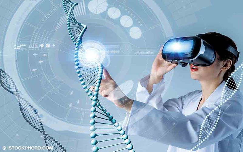 A female doctor pokes at a virtual DNA strand while wearing a VR headset.