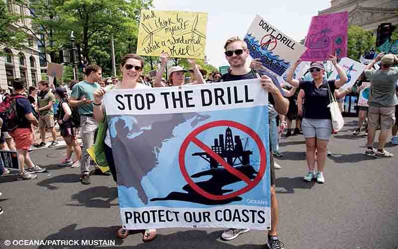 Ocean activists march in Washington, D.C., in support of a variety of marine ecology initiatives on World Oceans Day.