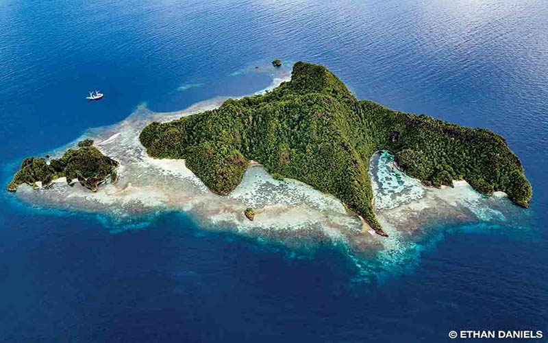 An island is viewed from the sky.