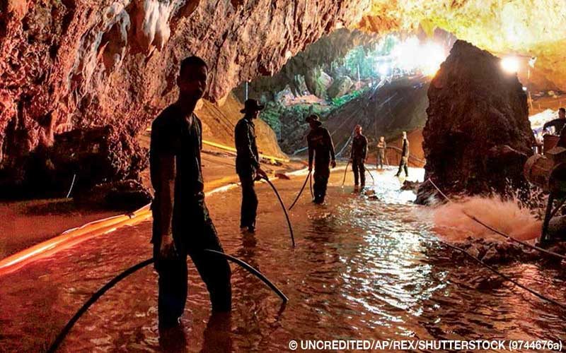 Thai Navy SEALs and civil engineers prepare more pipelines to pump more than 3 billion liters (nearly 800 million gallons) of water out of the flooded cave.