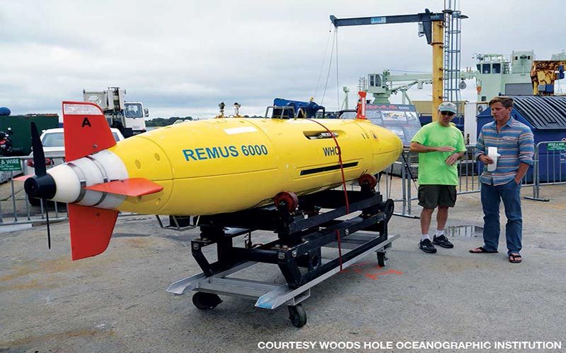 REMUS is a yellow underwater vehicle