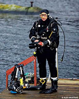 Diver prepares for a cold-water dive in Norway