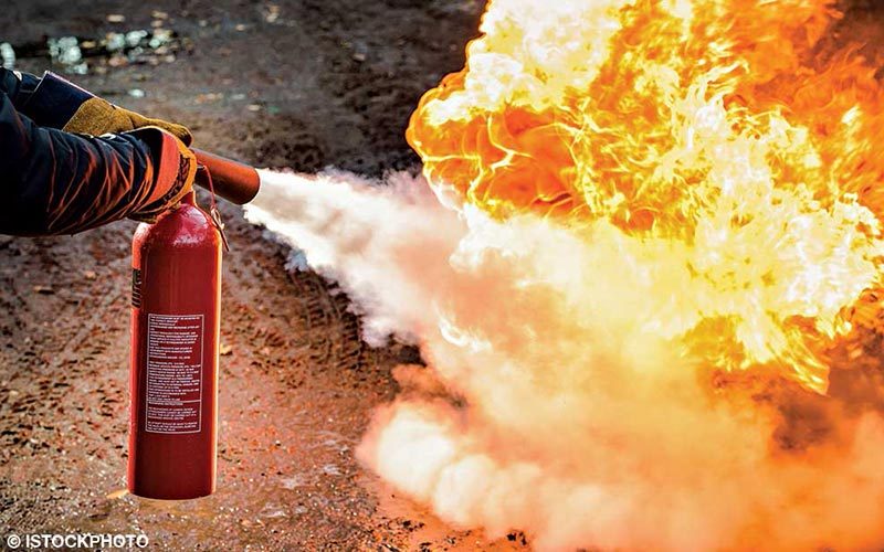A fire extinguisher is used to extinguish a fire