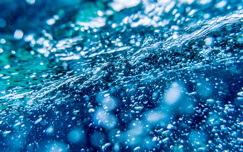 Whole bunch of underwater bubbles