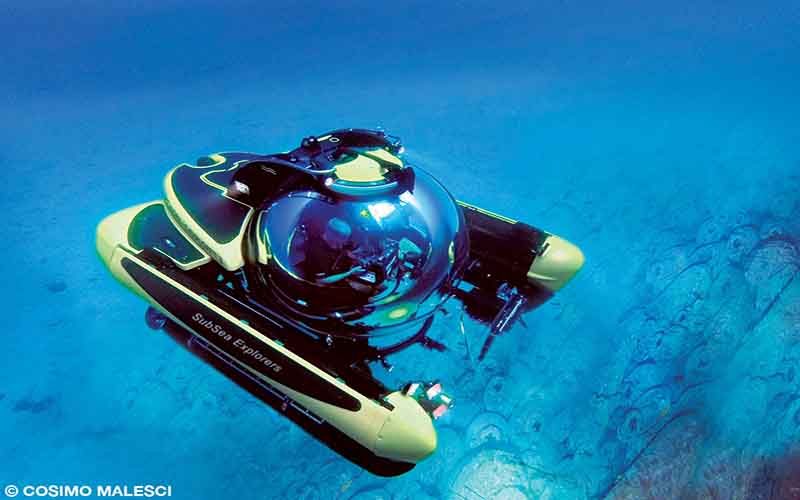 DAN member Ian Koblick operates a yellow submersible off Sicily.