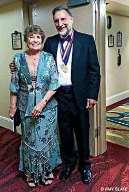 DAN member Ian Koblick poses with his wife before an awards gala.