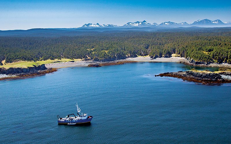 Big, vast Alaskan bay and a boat