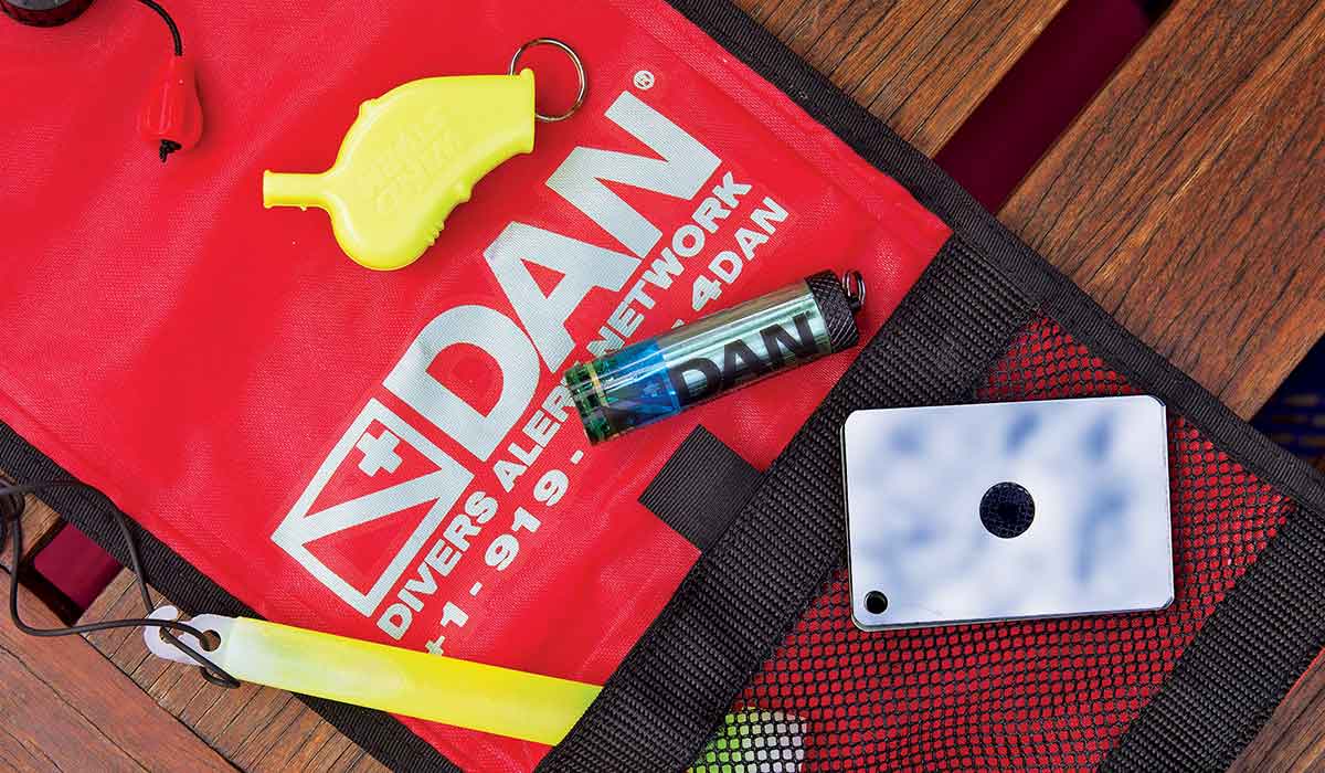 DAN emergency signaling kit has a whistle and glow stick
