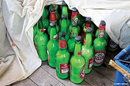 A collection of green, homemade bottle bombs