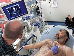 A hyperbaric doctor examines tech diver Jeff Shirk using 3-D ultrasound. Earlier in the day Shirk experienced a serious case of acute immersion pulmonary edema during a dive.