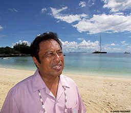 President Remengesau walks on the beach in front of the Palau Pacific Resort
