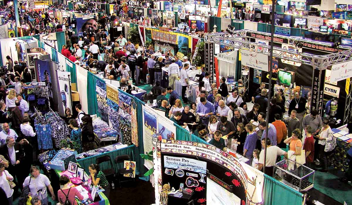 Aerial view of a busy convention center showcase floor
