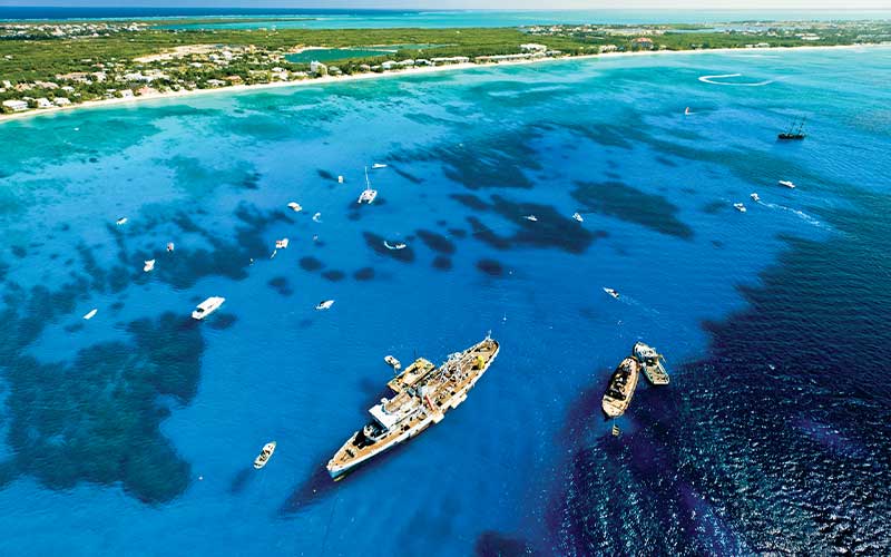 Aerial view of a variety of ships at Cayman Islands