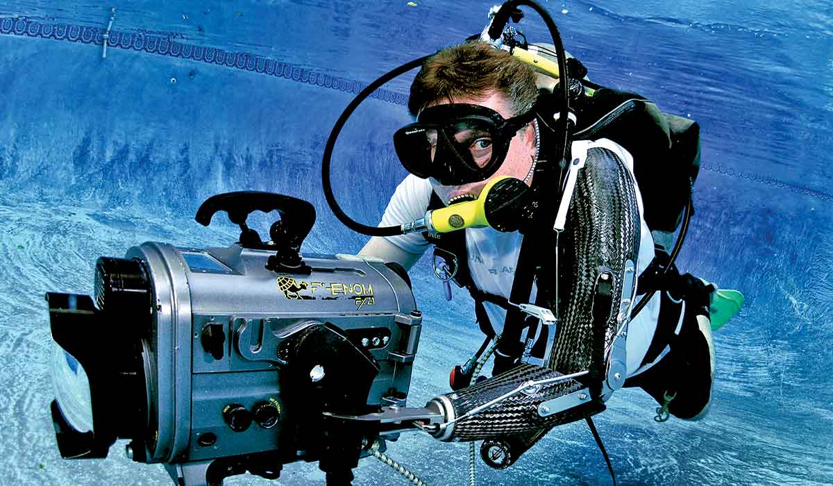 DAN member Rick Allen holds an underwater camera