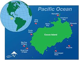 A map of Pacific Ocean and Cocos Island with dive sites marked 