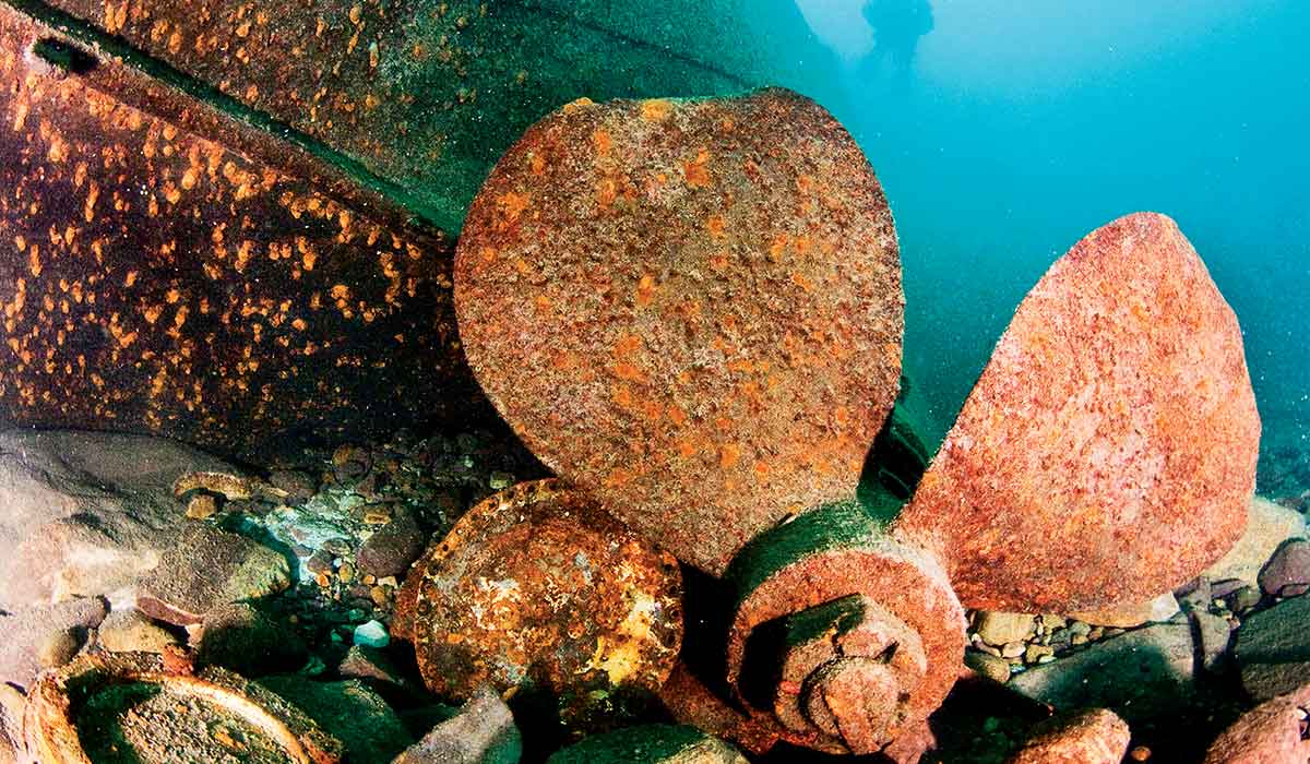 Rusted propeller of a very large, sunken ship