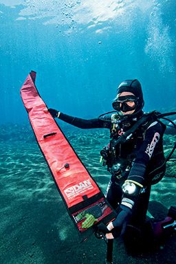 Submerged diver unraveled an uninflated marker