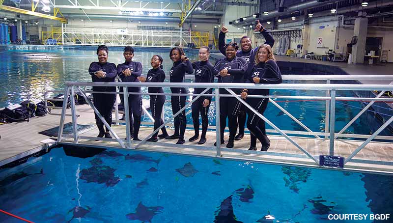 Students are ready to make the Journey with Gentle Giants dive at the Georgia Aquarium.