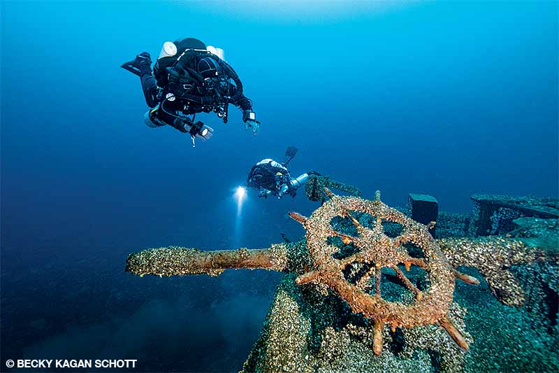 The wooden wheel on the stern of the Cornelia B. Windiate is one of the first things divers see as they descend to the wreck.