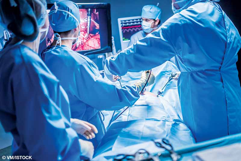 surgeons perform laparoscopic surgery