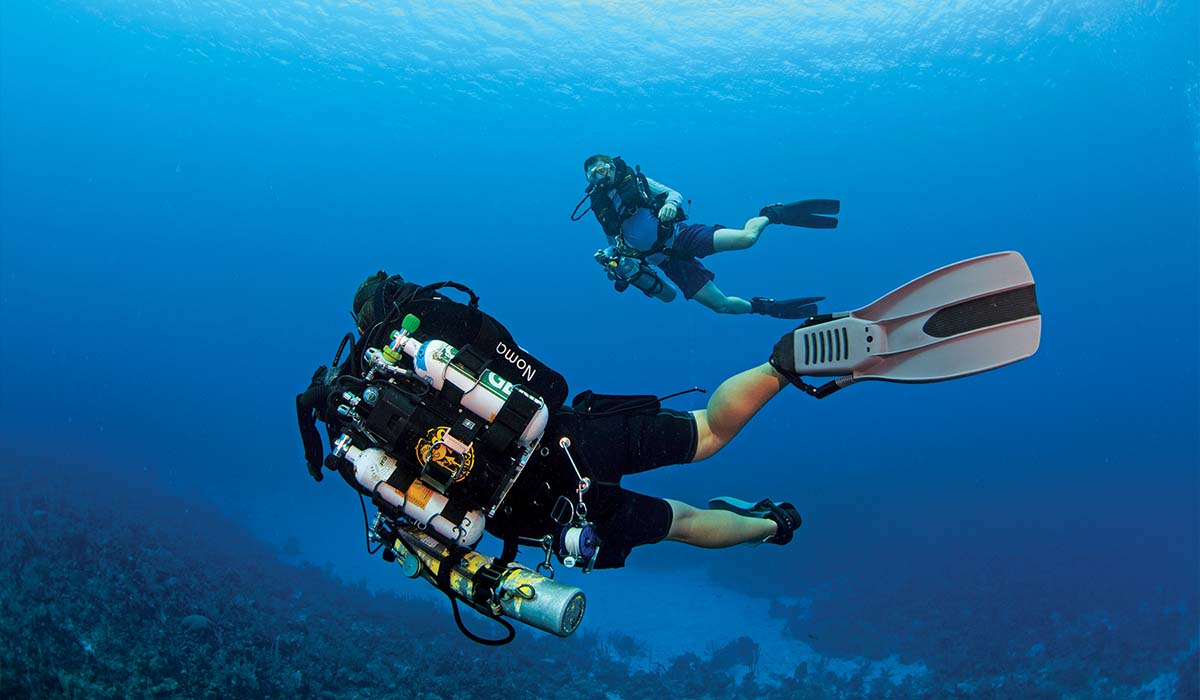 Two rebreather divers practice their skills in the ocean