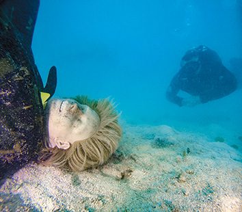 A training manikin is used for a simulated body recovery.