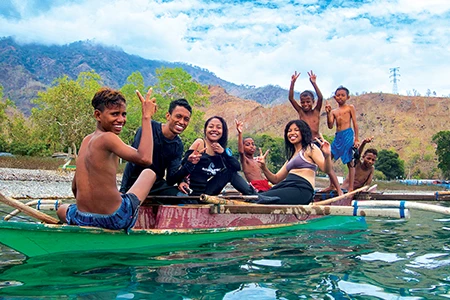 local youth at the Behau dive site