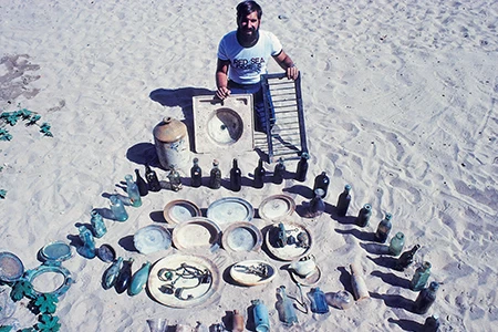The author poses with some artifacts from the Dunraven