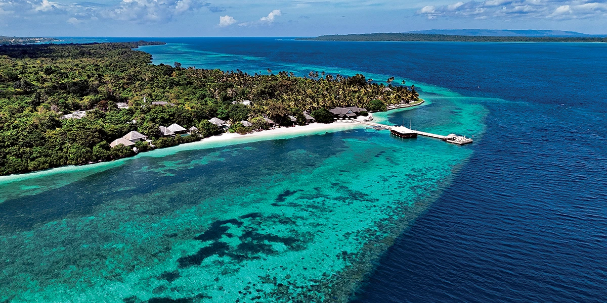 This aerial view shows the Wakatobi Resort and house reef.