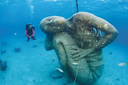 Sculptor Jason deCaires Taylor installed Ocean Atlas on the shallow seafloor