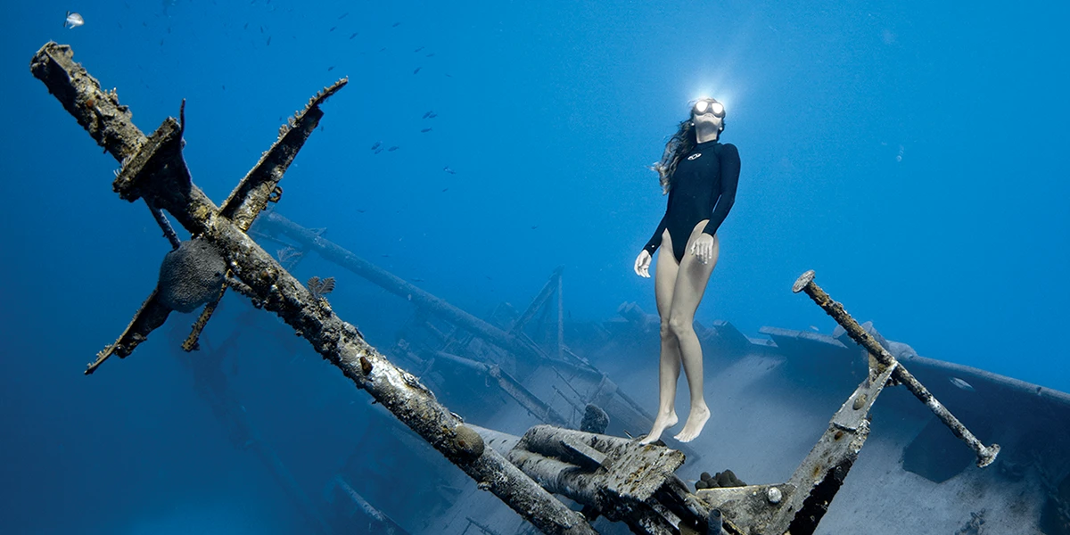 free diver on sunken ship