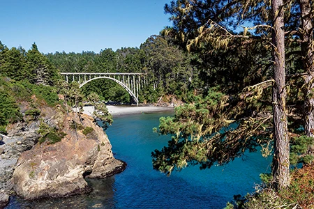 The sheltered cove at Russian Gulch State Park provides easy shore access to the often-rough ocean.